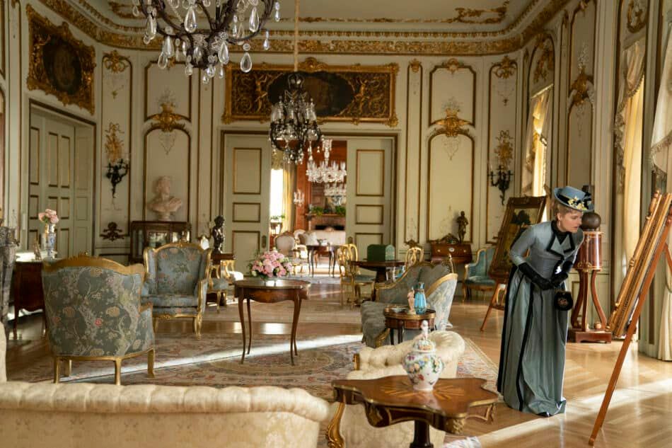 a person in a room with chairs and tables