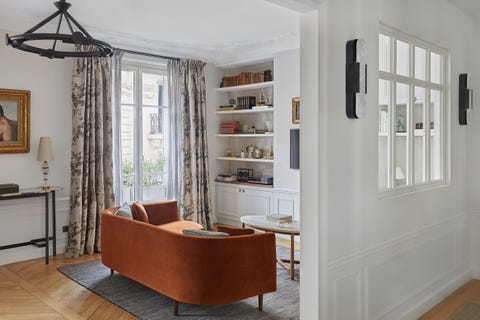 orange couch in living room