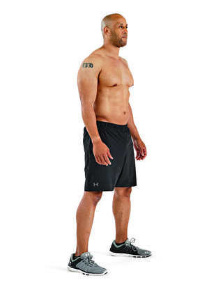 board short, Clothing, Standing, Shorts, Muscle, Arm, Human leg, Knee, Active shorts, Barechested, 
