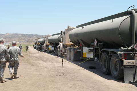 a convoy of fuel trucks stops to have their fuel cargo tested at the quartermaster liquid logistics excercise, camp pendleton, ca qllex is a joint forces exercise where 64 units at eight locations across the continental united states will deliver more than 325 million gallons of petroleum and produce 479,000 gallons of water, designed to challenge and develop the battalion's staff military decision making skills us army photo by spc thomas x croughreleased