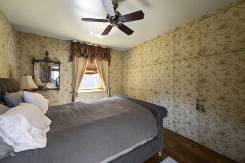 Bedroom, Ceiling fan, Bed, Room, Property, Furniture, Bed sheet, Wall, Floor, Interior design, 