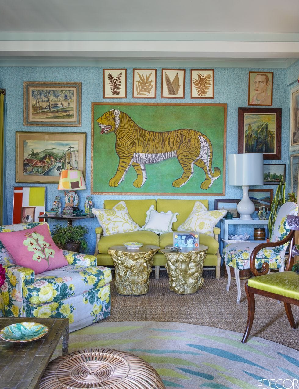 lively living room with bold art and colorful furniture lively living room with bold art and colorful furniture