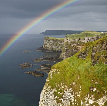 Vegetation, Nature, Green, Natural landscape, Rainbow, Coastal and oceanic landforms, Landscape, Coast, Rock, Colorfulness, 