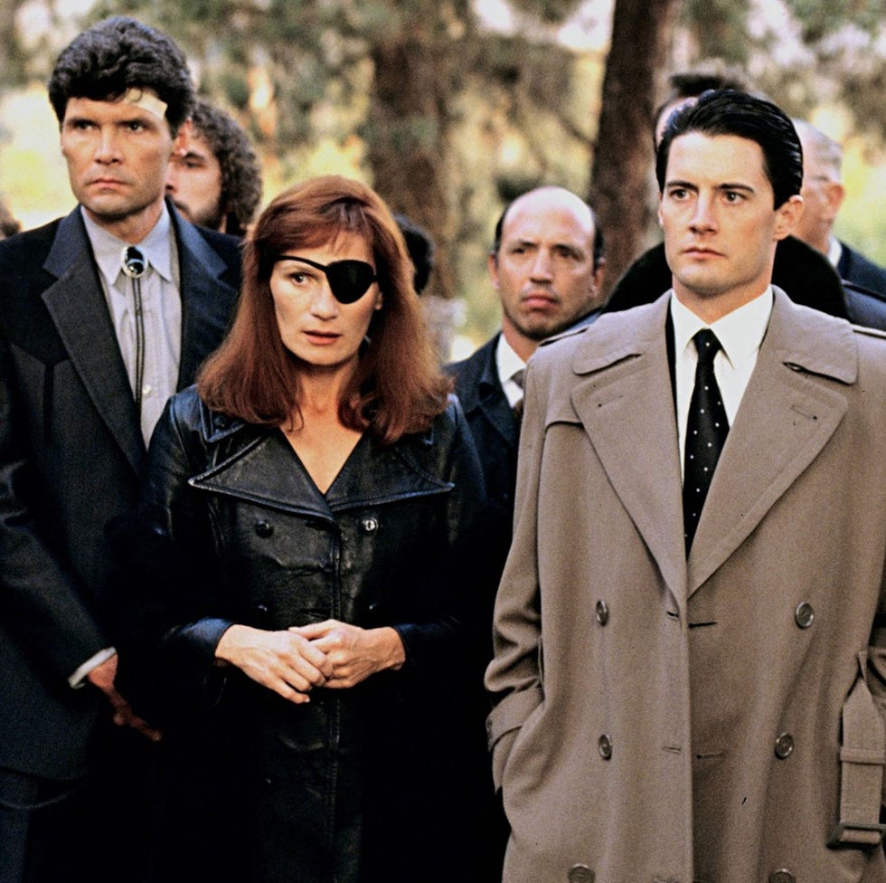 group of people dressed in formal attire outdoors group of people dressed in formal attire outdoors