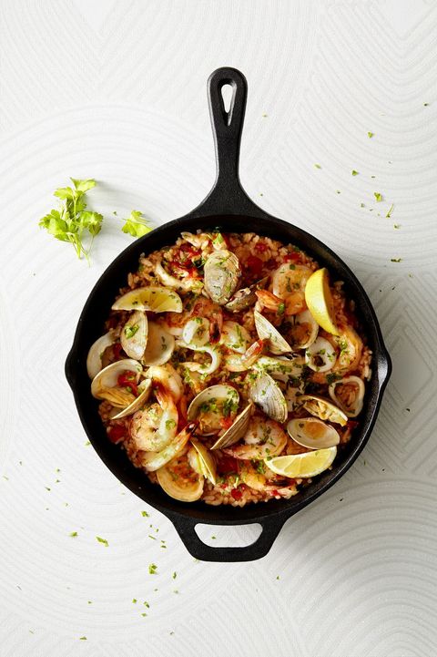 easy seafood paella in a black skillet
