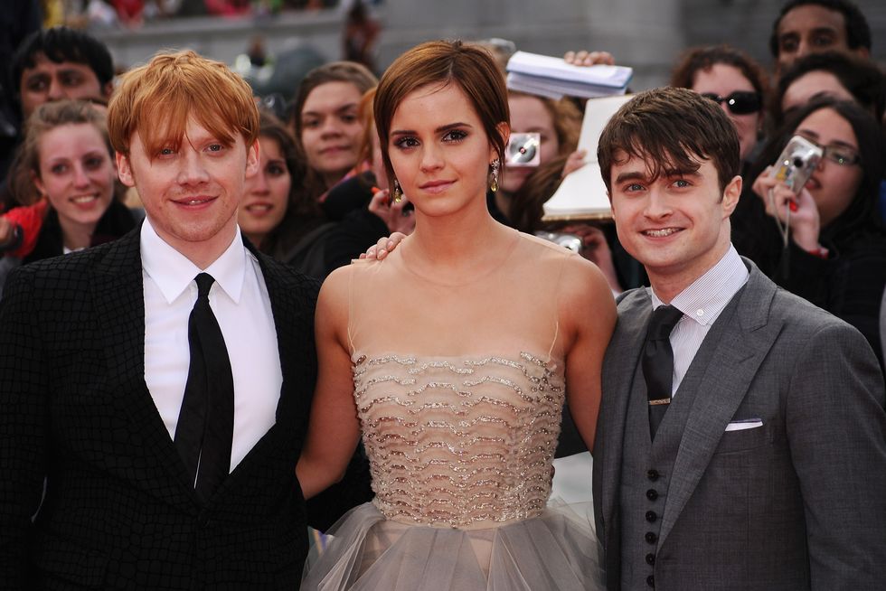 london, england   july 07  l r rupert grint, emma watson and daniel radcliffe attend the world premiere of harry potter and the deathly hallows   part 2 at trafalgar square on july 7, 2011 in london, england  photo by ian gavangetty images