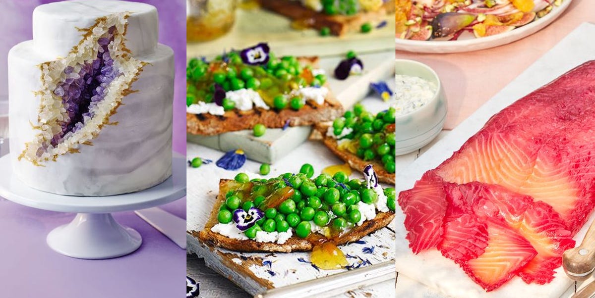 a display of a decorative cake and various gourmet dishes a display of a decorative cake and various gourmet dishes