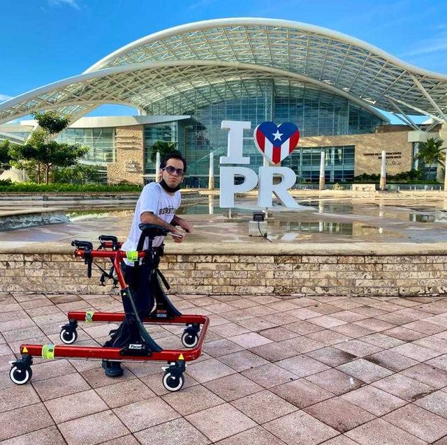 sebastian rosado using his walker to complete his 1k as part of his 21k in 30 days challenge