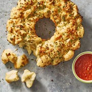cheesy monkey bread on gray table cheesy monkey bread on gray table