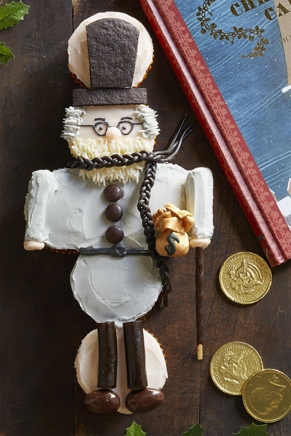 scrooge cupcakes on dark wood