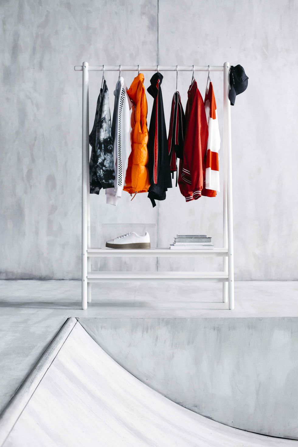 White, Clothes hanger, Orange, Room, Furniture, Shelf, Wardrobe, 