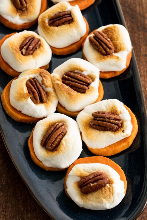sweet potato bites with toasted marshmallow and pecans on top