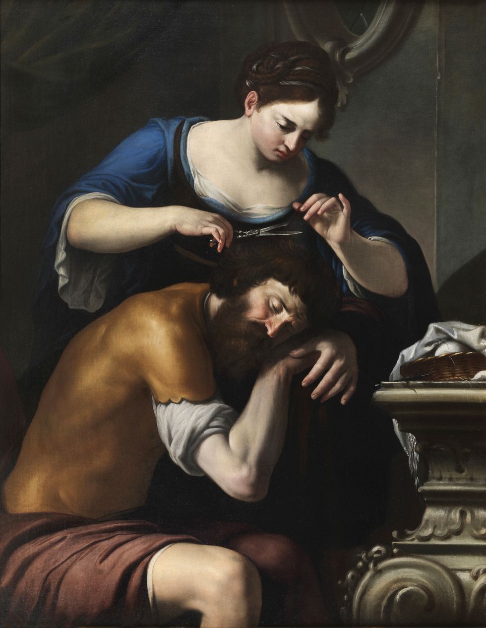 artemisia gentileschi a painting of a man holding a woman