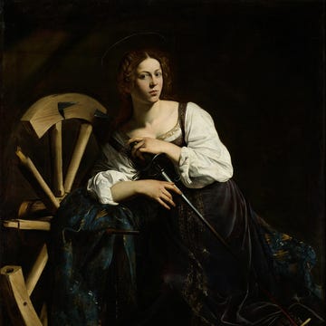 seated figure with a spinning wheel and weaving tools seated figure with a spinning wheel and weaving tools