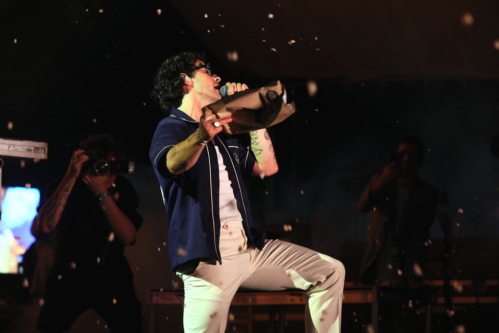 hallandale, florida january 28 joe jonas throws popcorn while performing onstage at the carousel club at the 2023 pegasus world cup with liv x palm tree crew on january 28, 2023 in hallandale, florida photo by alexander tamargogetty images for 1st