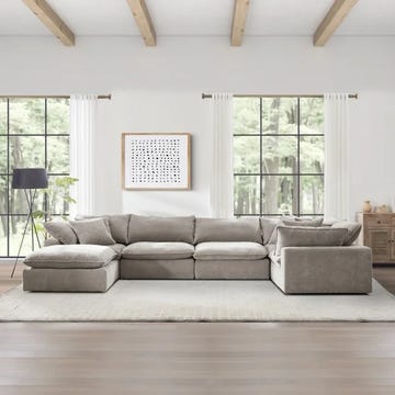 costco cloud couch dupe modern living room featuring a large sectional sofa