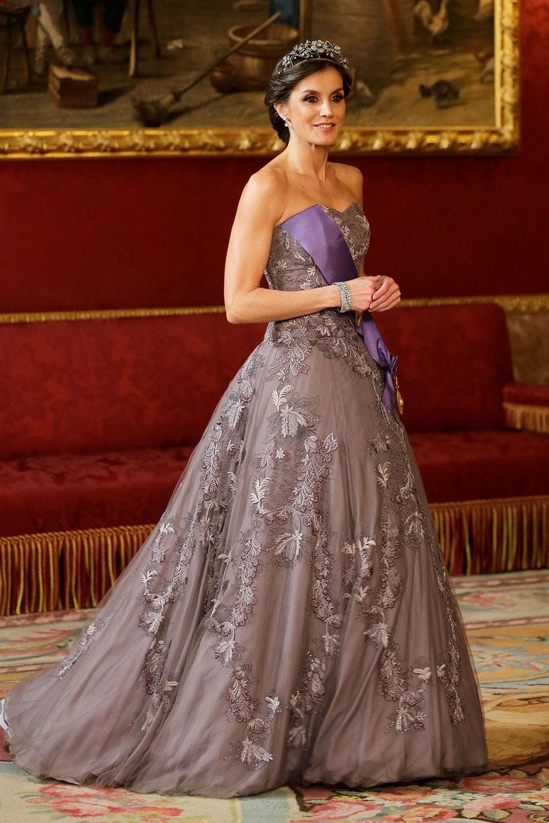 Clothing, Dress, Hairstyle, Shoulder, Textile, Formal wear, Gown, Style, Headpiece, Fashion, 