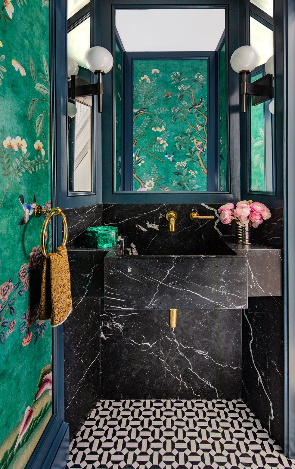 powder room with marble vanity and floral wallpaper