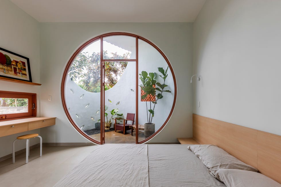 arquitectura organica, curvas y materiales naturales para una casa que redefine el concepto de hogar en un entorno tropical