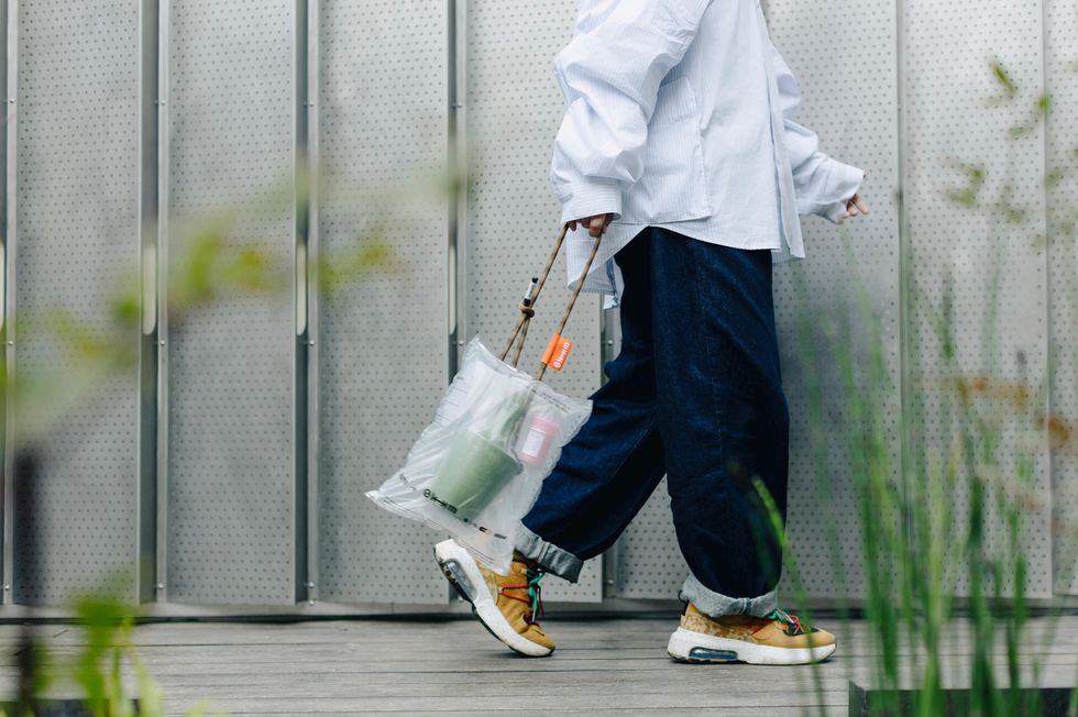 a person walking with a bag