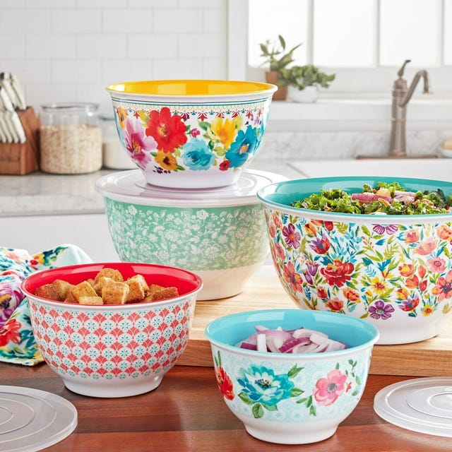 a group of bowls with colorful designs
