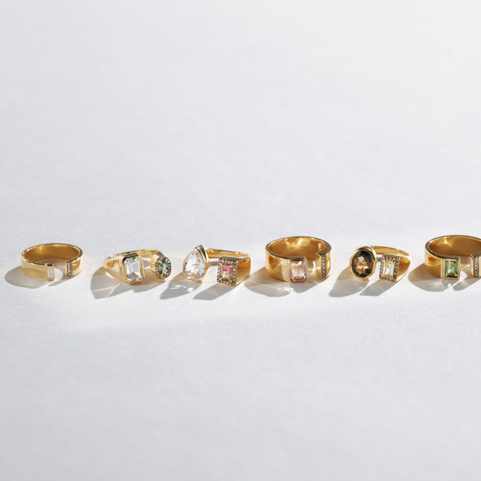 a group of gold and silver rings