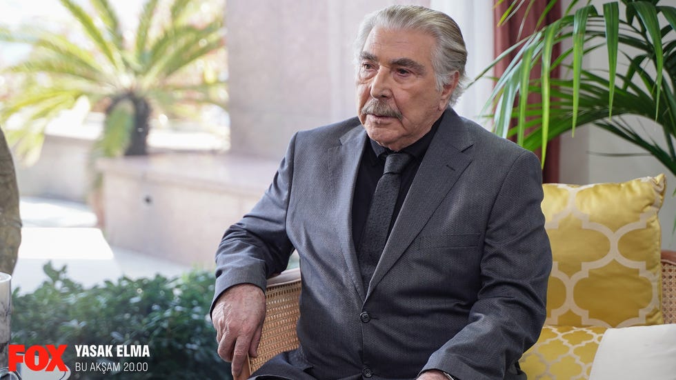 a man sitting in a chair
