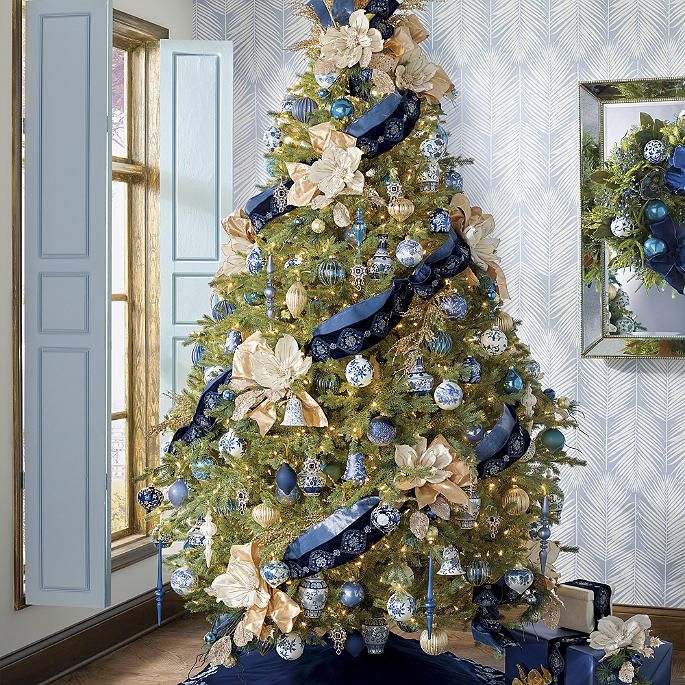 Blue decorated tree with feathers.