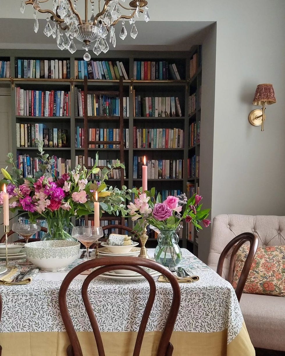 table with vase and candles