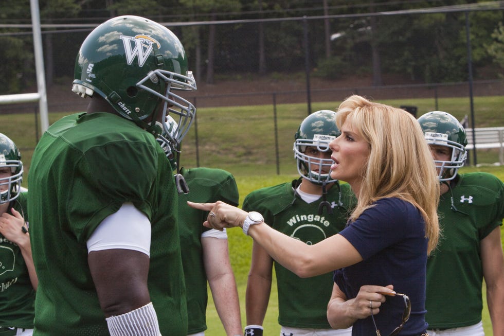 Helmet, Sports gear, American football, Football gear, Football equipment, Gridiron football, Team sport, Personal protective equipment, Player, Green, 