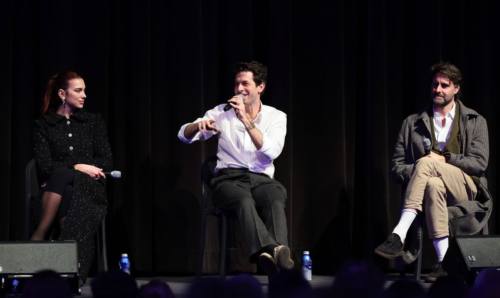 new york, new york november 30 l r dua lipa, wearing chanel, mark ronson and andrew hyatt speak onstage during momas the contenders 2023 screening of barbie, film at moma is made possible by chanel at museum of modern art on november 30, 2023 in new york city photo by dimitrios kambouriswireimage