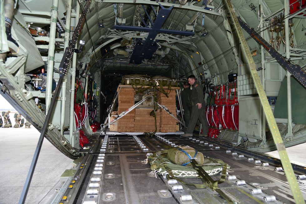 us army paratroopers from the 173rd airborne brigade and airmen from the 86th airlift wing load a us air force c 130 with palletized and parachute rigged equipment march 24, 2015 at aviano air base, italy, for an airborne operation for the early entry portion of exercise saber junction 15 in smardan, romania saber junction 15 involves 5,000 soldiers  from 18 nations and takes place across germany, italy, lithuania and romania us army photo by visual information graigg faggionatoreleased