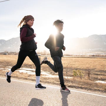 a woman and man running side by side a woman and man running side by side