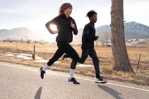 two people running fast outside, how to build stamina