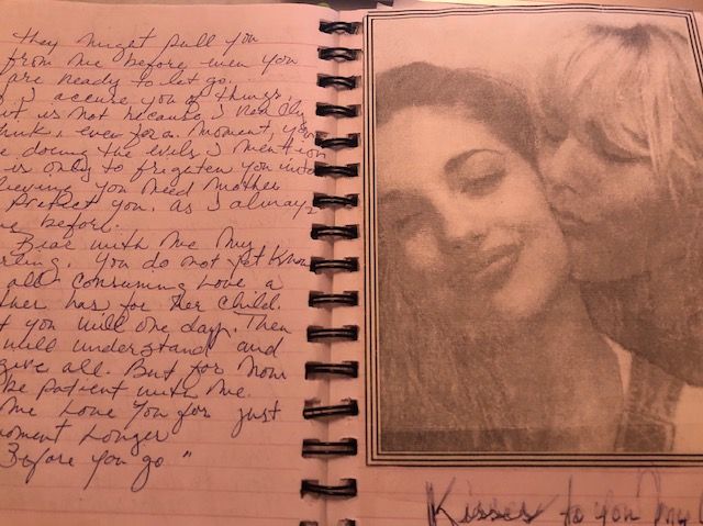 a page from the journal of minka kelly's mother, with an entire handwritten in cursive and a photo of minka and her mom