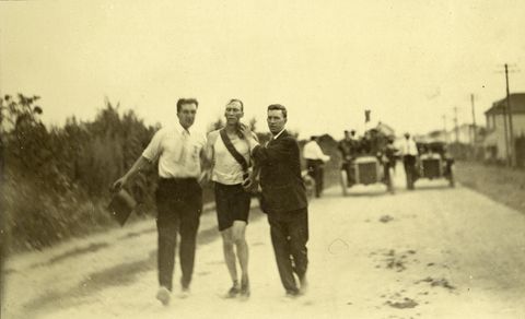 tj hicks of cambridge, massachusetts, winner of marathon foot race being sponged by attendants in the 1904 olympics