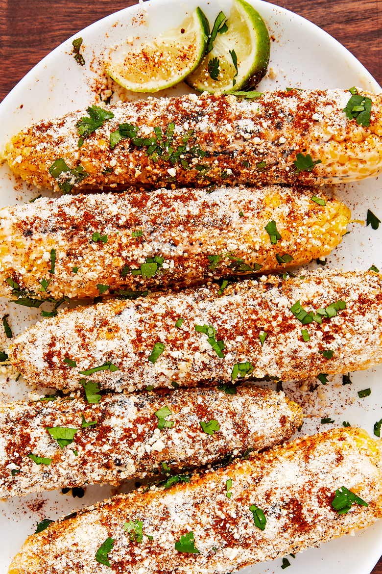 https://hips.hearstapps.com/hmg-prod/images/190409-mexican-corn-on-the-cob-vertical-1-1555623819.png?crop=0.795xw:0.796xh;0.0842xw,0.0726xh&resize=980:*