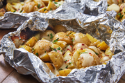 Cheesy Foil Pack Potatoes - Delish.com