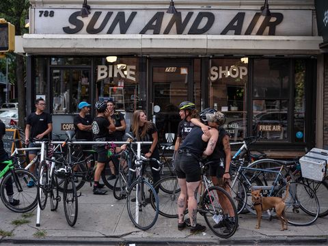 Friends of Robyn Hightman gather outside Sun and Air bike shop in Brooklyn, NY on Saturday, August 24, 2019