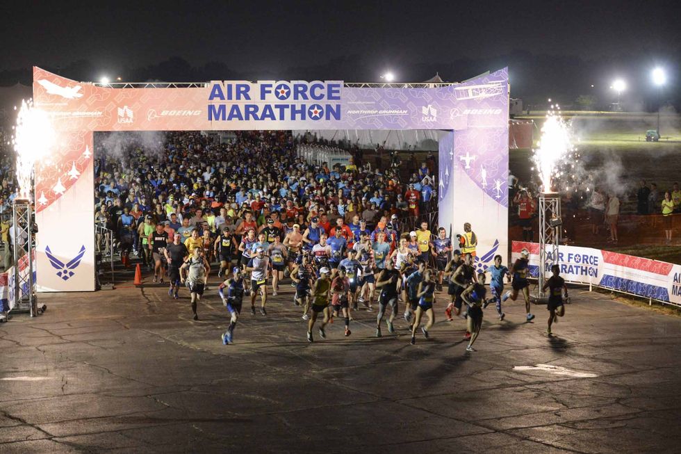 runners take off at the start of the 2019 air force marathon