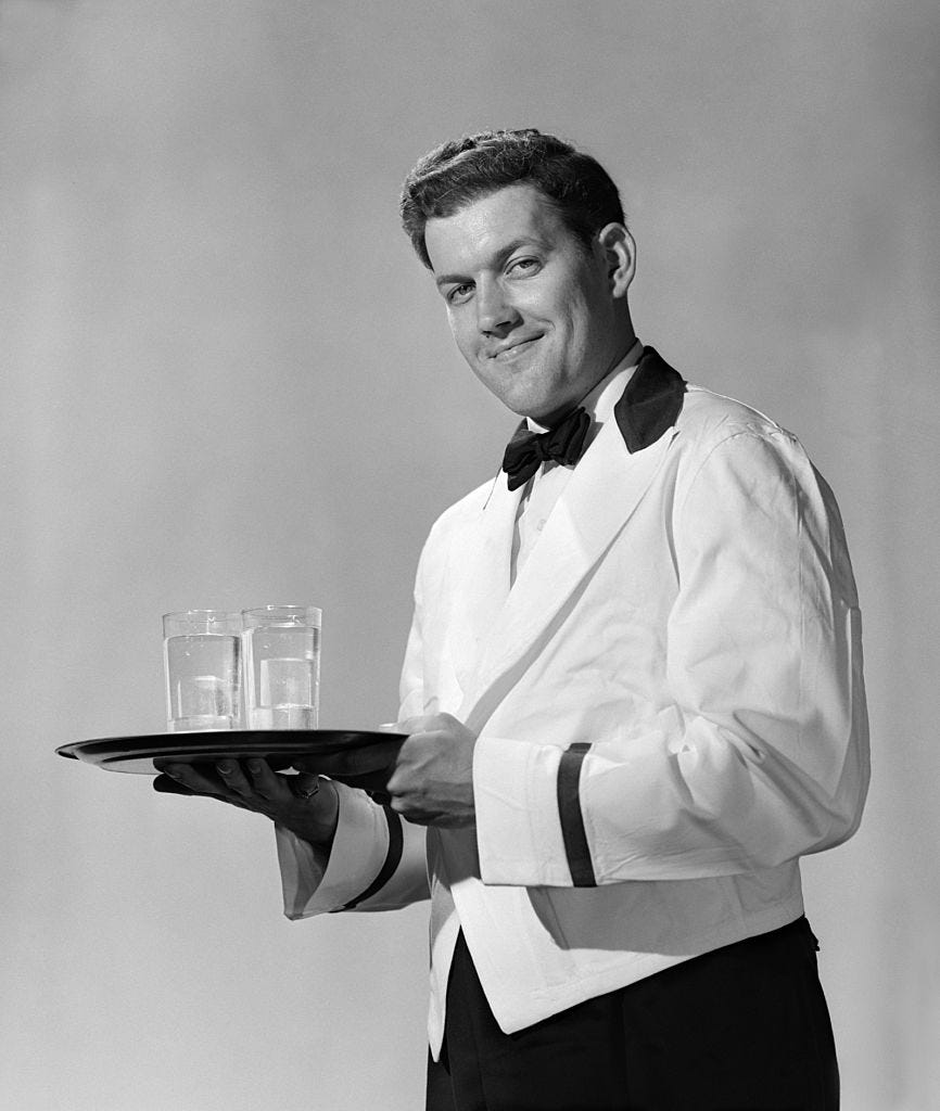 1950s SMILING MAN WAITER...