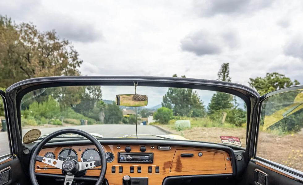 1972 lotus elan roadster interior dash with the top down