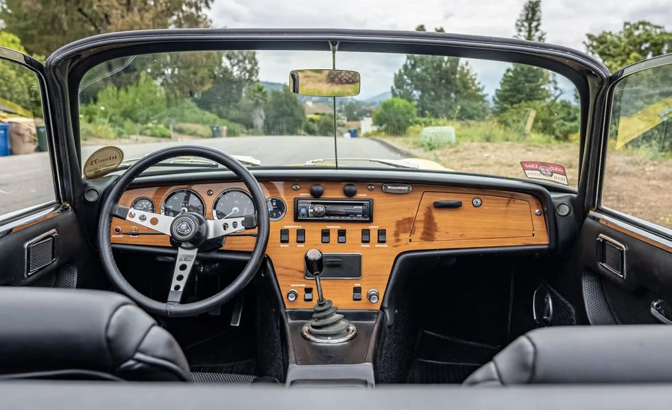 1972 lotus elan roadster interior dash with the top down