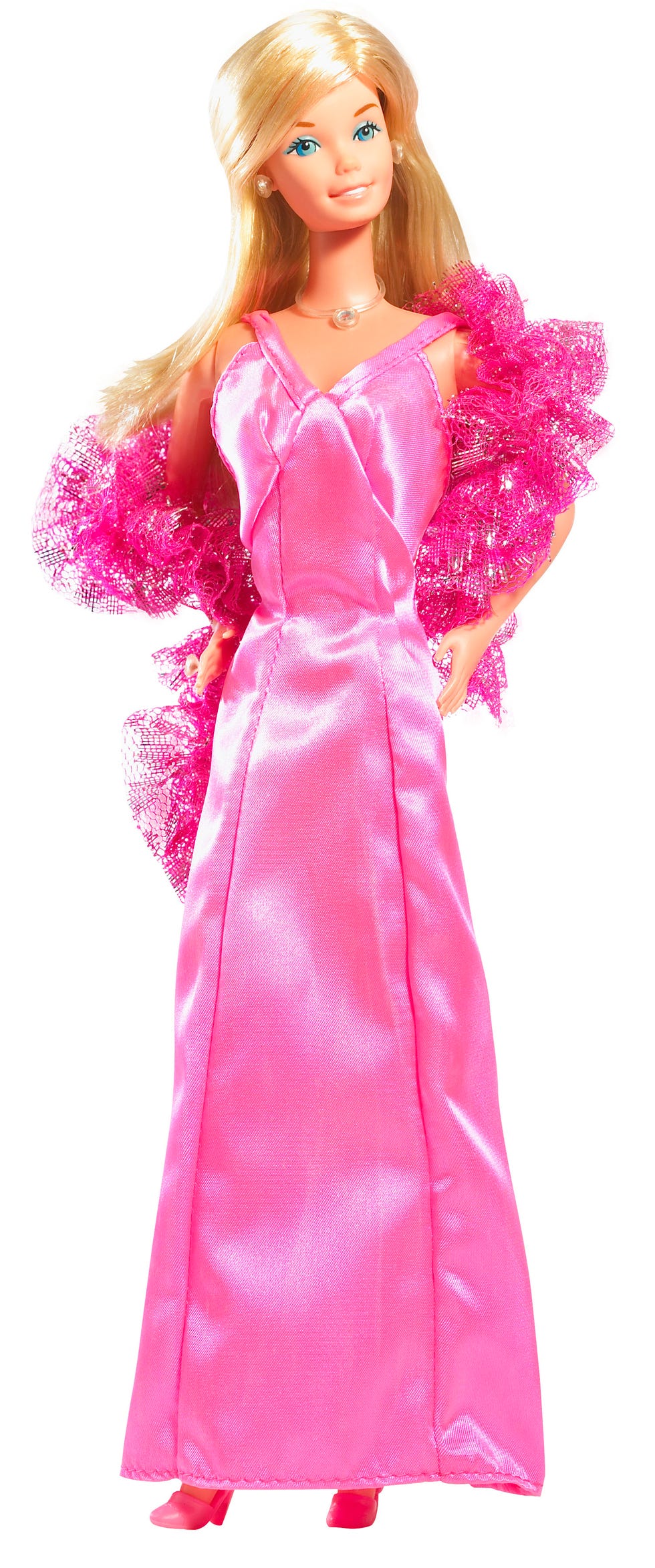 a doll in a pink dress