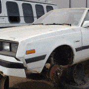 1983 dodge charger and 1982 dodge challenger in colorado wrecking yard