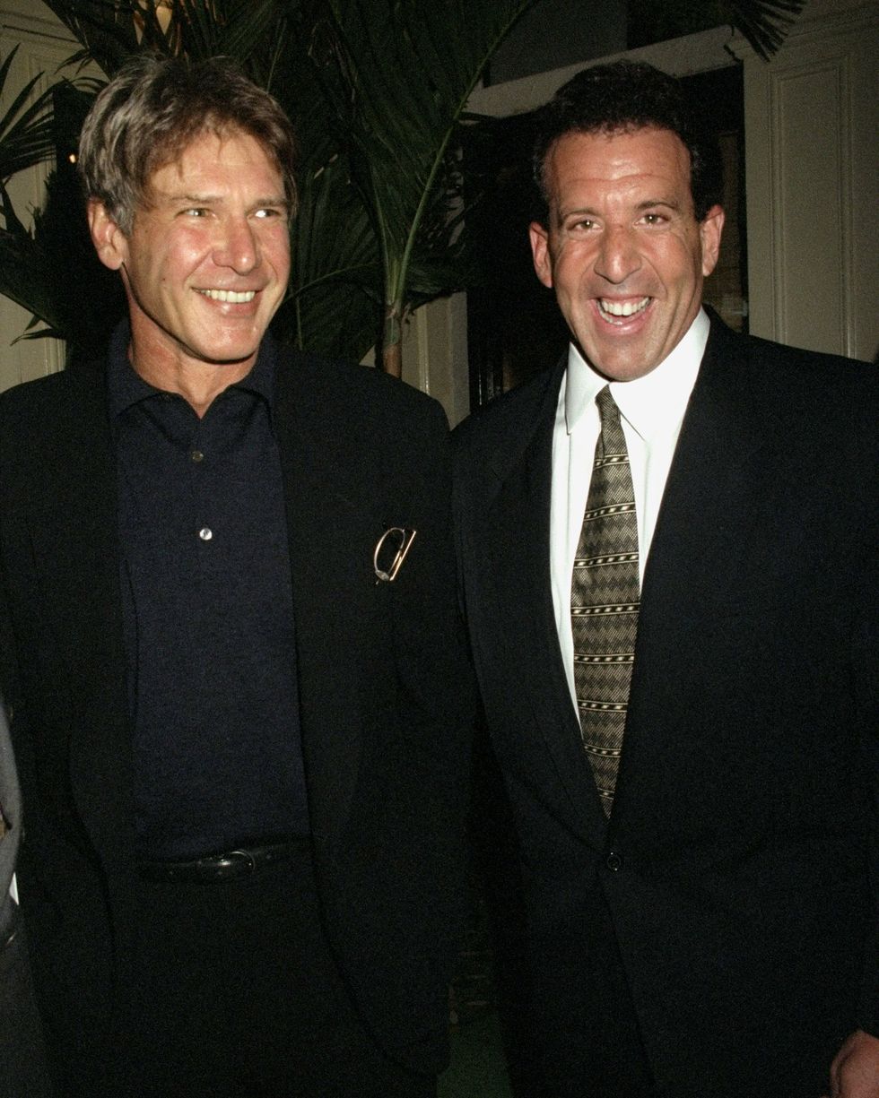 united states april 17 actor harrison ford left joins jake steinfeld at party in le colonial restaurant to launch the magazine body by jake steinfeld was fords trainer for the indiana jones movies photo by richard corkeryny daily news archive via getty images