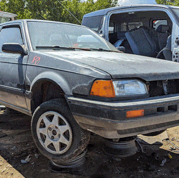 1988 mazda 323 gtx in colorado junkyard animated