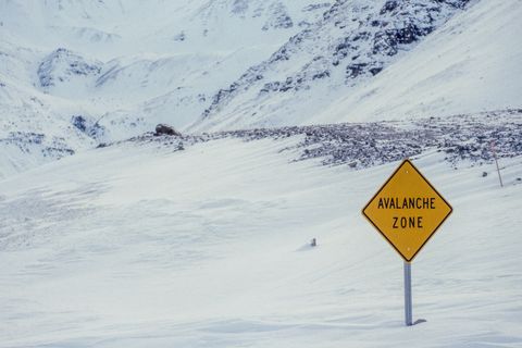 avalanche warning sign off dalton highway, alaska