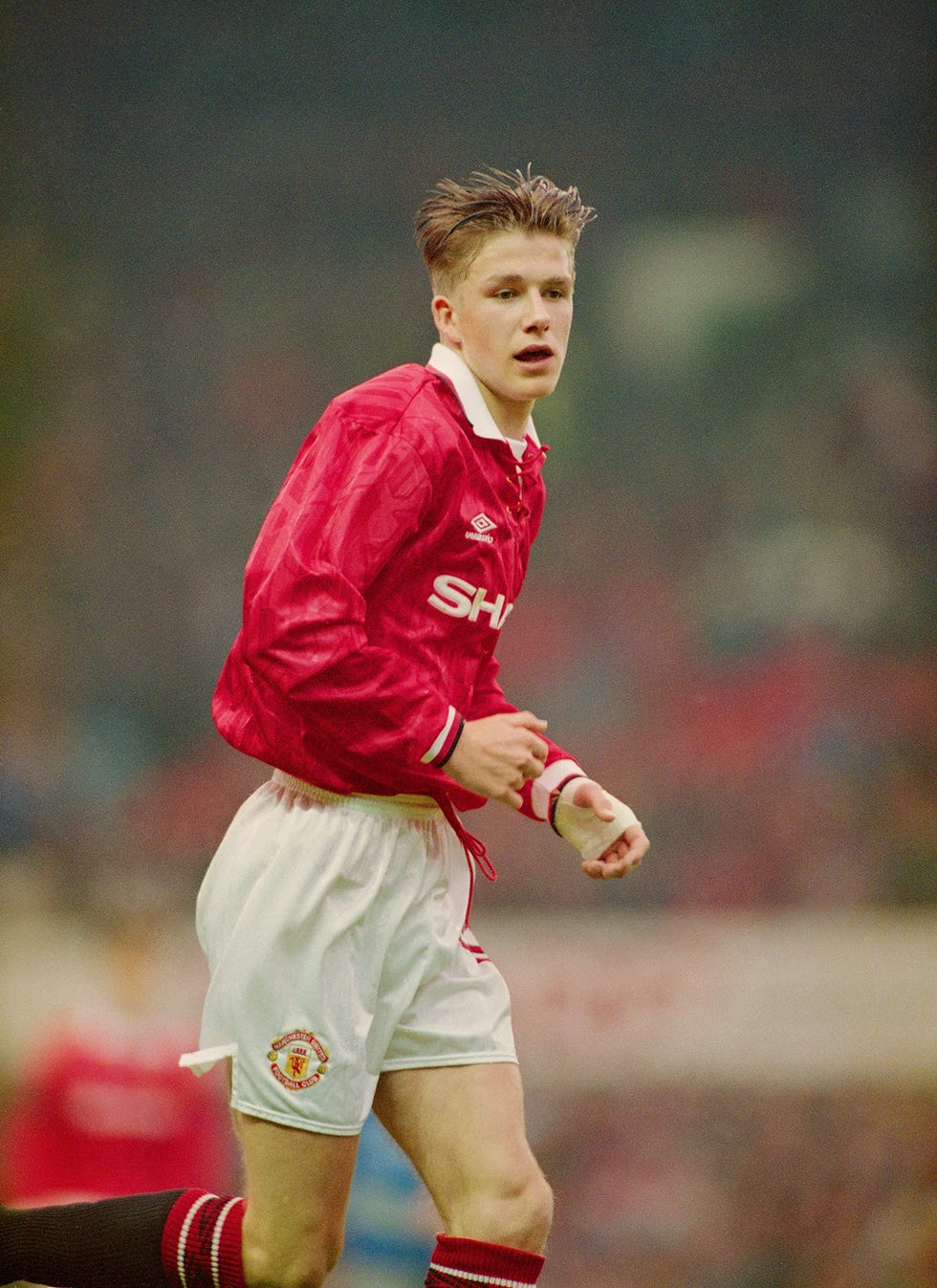 manchester, england december 18 david beckham of manchester united in action during a youth team game at old trafford on may 13, 1993 in manchester, england photo by shaun botterillallsportgetty images