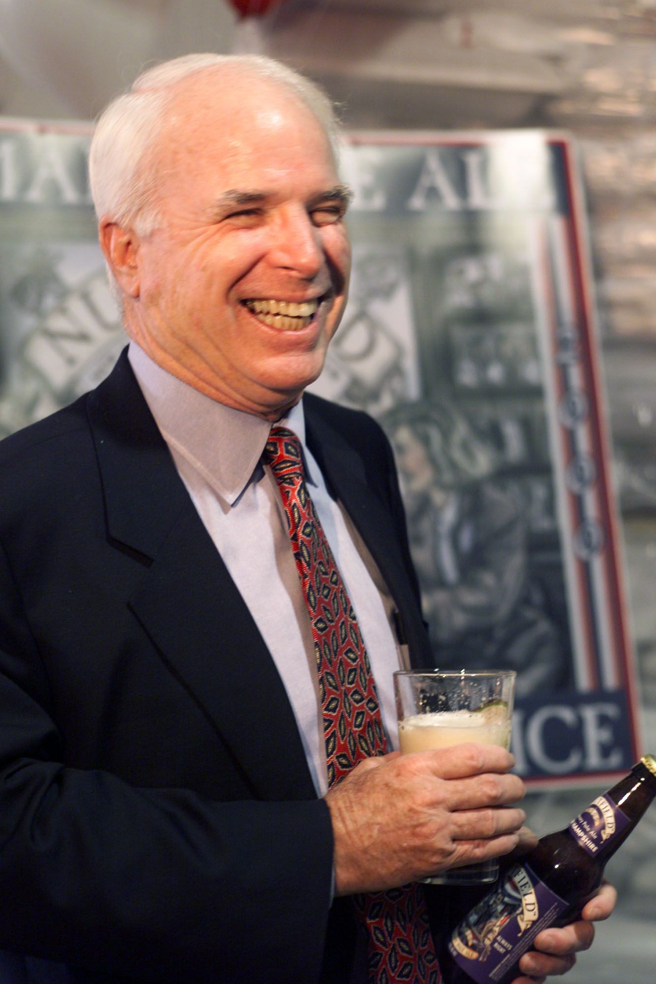 John Mccain Arms Above Head